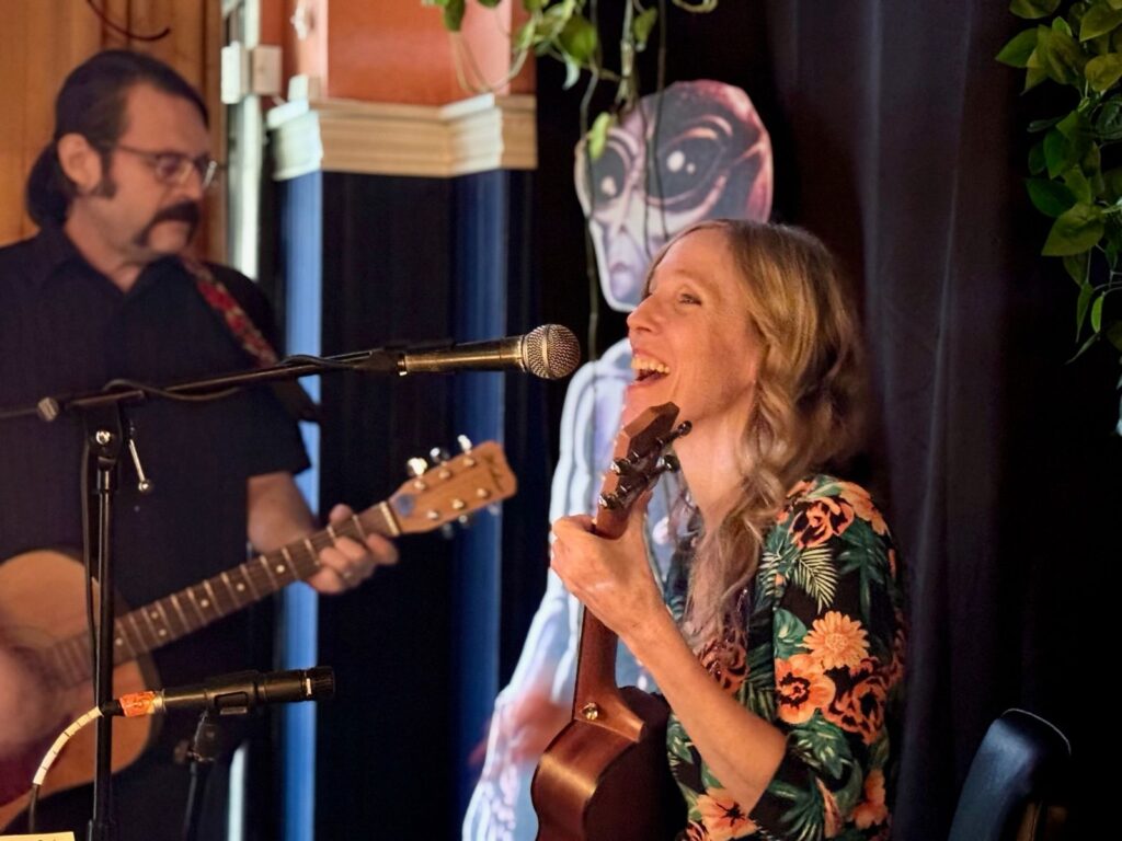 This image has an empty alt attribute; its file name is Erin-performing-1-1024x768.jpg